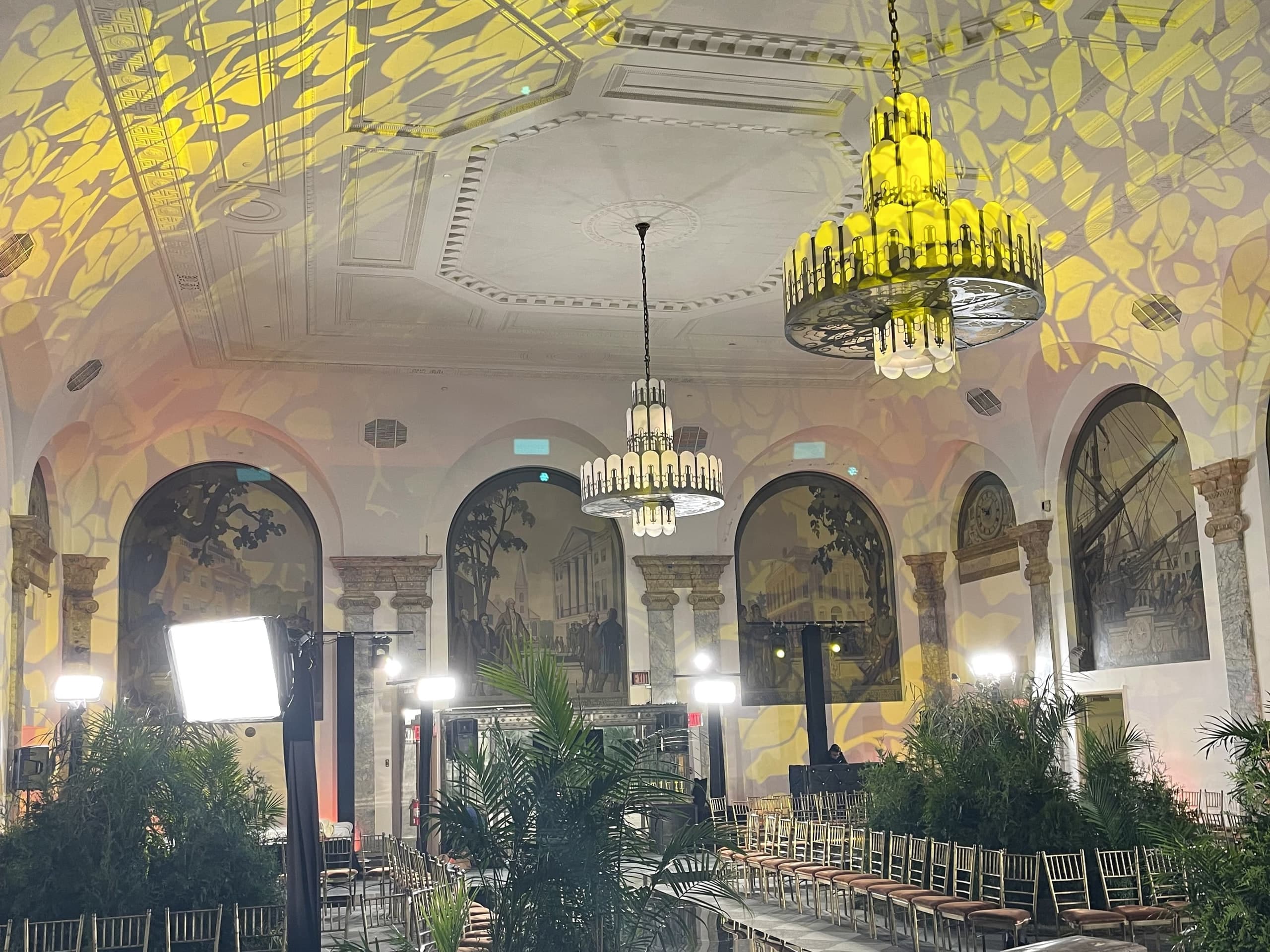 Dramatic event lighting beneath 30-foot ceilings at 48 Wall Street