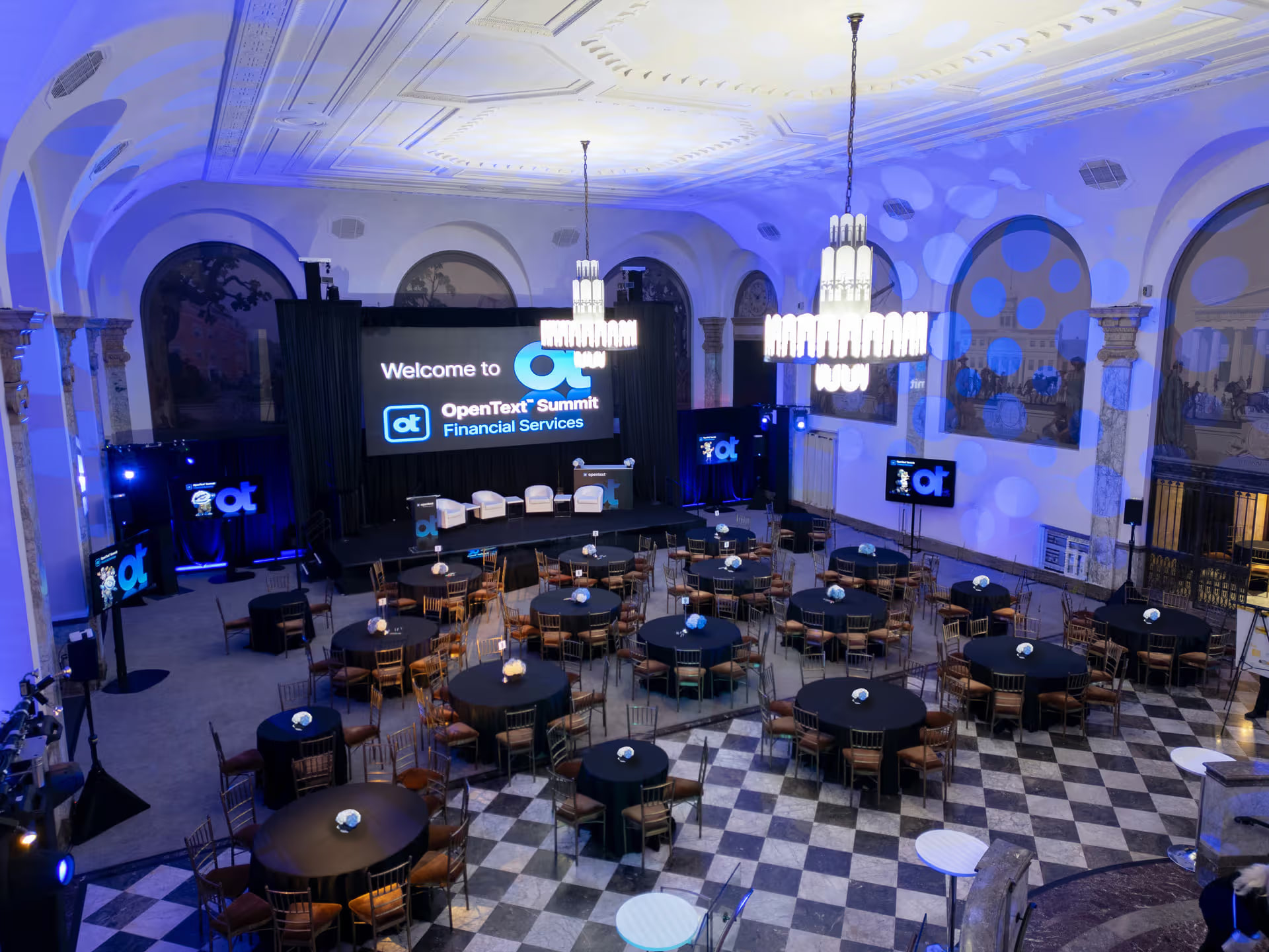 Investor summit conference with theater seating and main stage